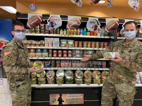 Soldiers grab a quick meal from a fueling station at the Fort Myer Commissary in Virginia Thumbnail