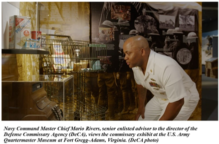 Navy Command Master Chief Mario Rivers views the commissary exhibit at the US Army Quartermaster Museum