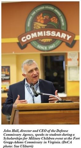 DeCA Director John Hall speaks at a scholarship event at the Fort Gregg-Adams Commissary in Virginia